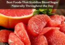 best foods that stabilize blood sugar naturally, including leafy greens, avocado, raw nuts, eggs, lentils, and berries arranged on a rustic kitchen table.